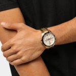 1791365-tommy-hilfiger-watch-5atm-165-feet-water-resistant-men-white-dial-metal-stainless-steel-gold-strap-quartz-battery-analog-three-hand-erik_2_014bf6fc-c3ee-4c9b-88a6-ce192ca8be40.jpg