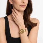 mk4923-michael-kors-watch-women-mk-logo-gold-dial-stainless-steel-metal-golden-strap-quartz-battery-analog-three-hand-phoebe-990x990_93c643cb-b0fd-41e5-9cfe-79ec74e6c517.jpg
