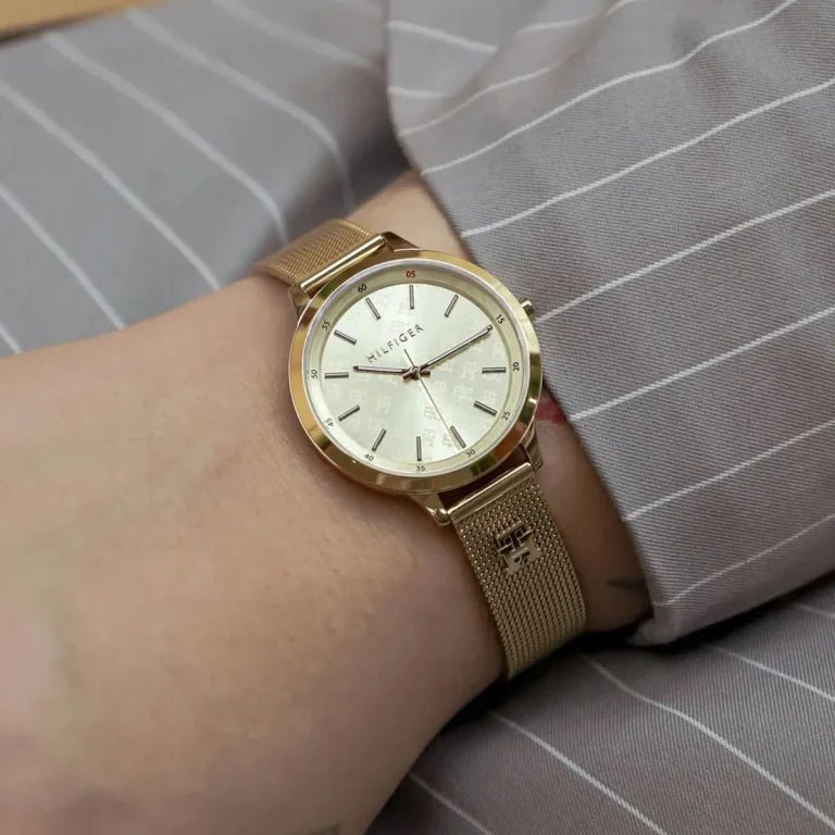 1782588-tommy-hilfiger-watch-women-gold-dial-mesh-metal-stainless-steel-golden-strap-quartz-battery-analog-three-hand-iris_5-768x768-1.jpg
