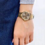 1782725-tommy-hilfiger-watch-women-crystals-brown-dial-metal-stainless-steel-gold-strap-quartz-analog-piper-990×990-1.jpg