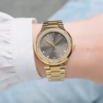 1782725-tommy-hilfiger-watch-women-crystals-brown-dial-metal-stainless-steel-gold-strap-quartz-analog-piper-990×990-1.jpg