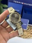 1782725-tommy-hilfiger-watch-women-crystals-brown-dial-metal-stainless-steel-gold-strap-quartz-analog-piper-990×990-1.jpg
